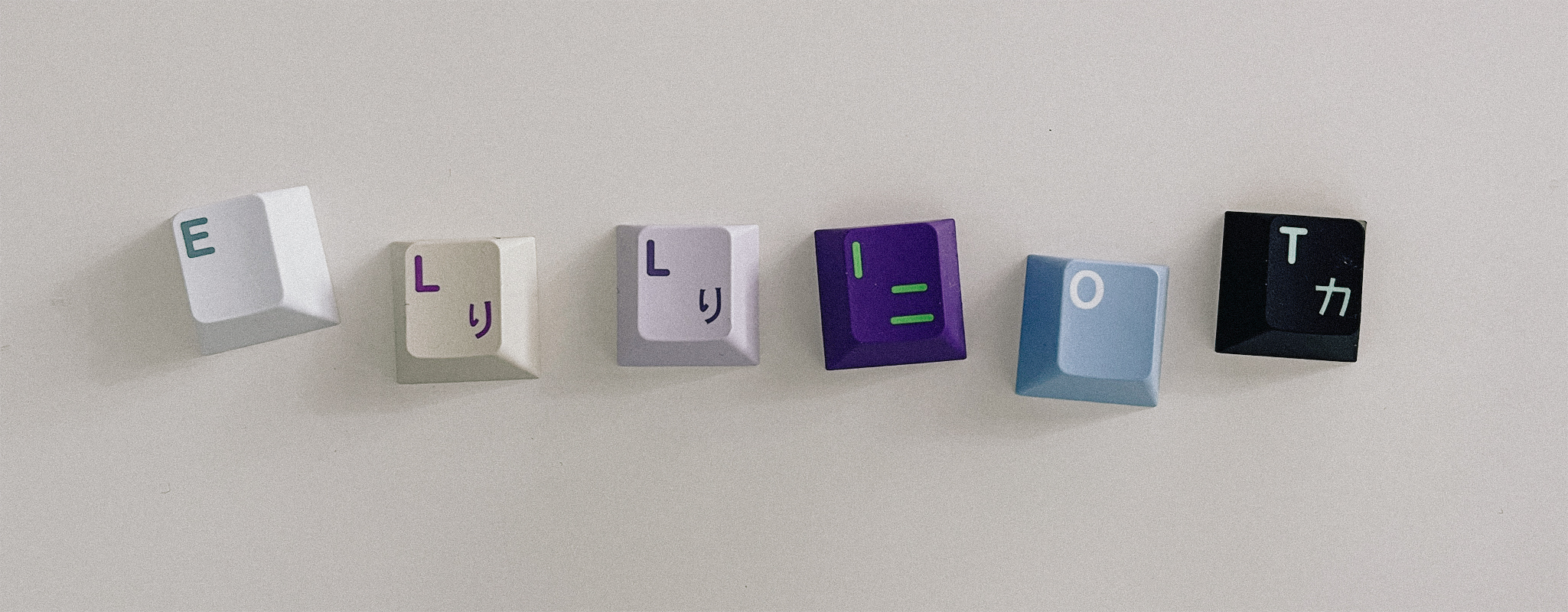 ELLIOT spelt with different coloured keycaps